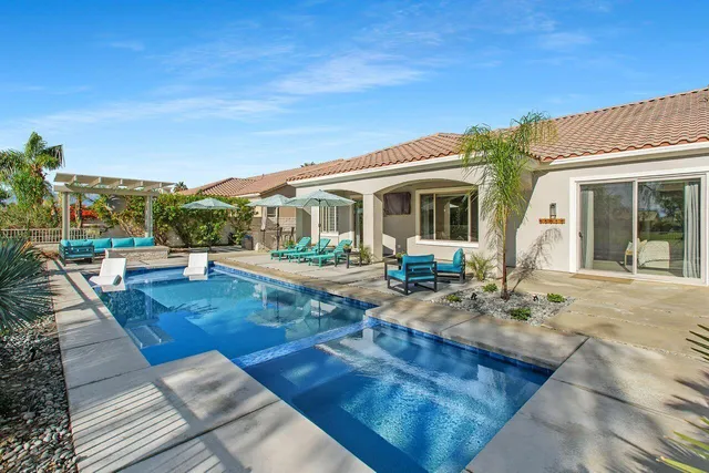 a view of a house with entertaining space