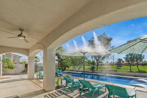 a view of a building from a floor to ceiling window
