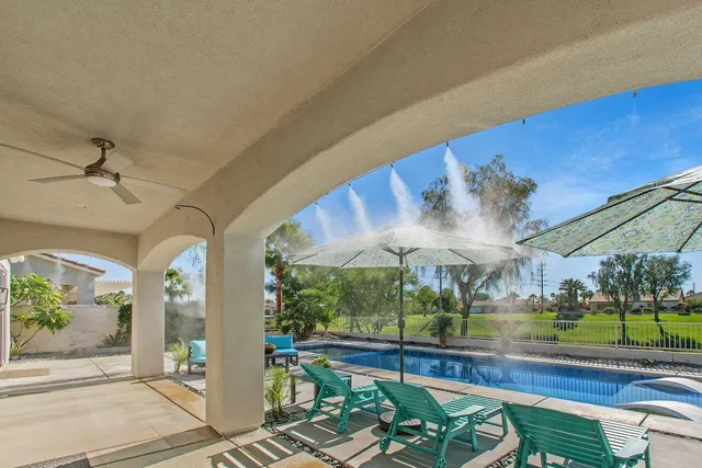 a view of a building from a floor to ceiling window