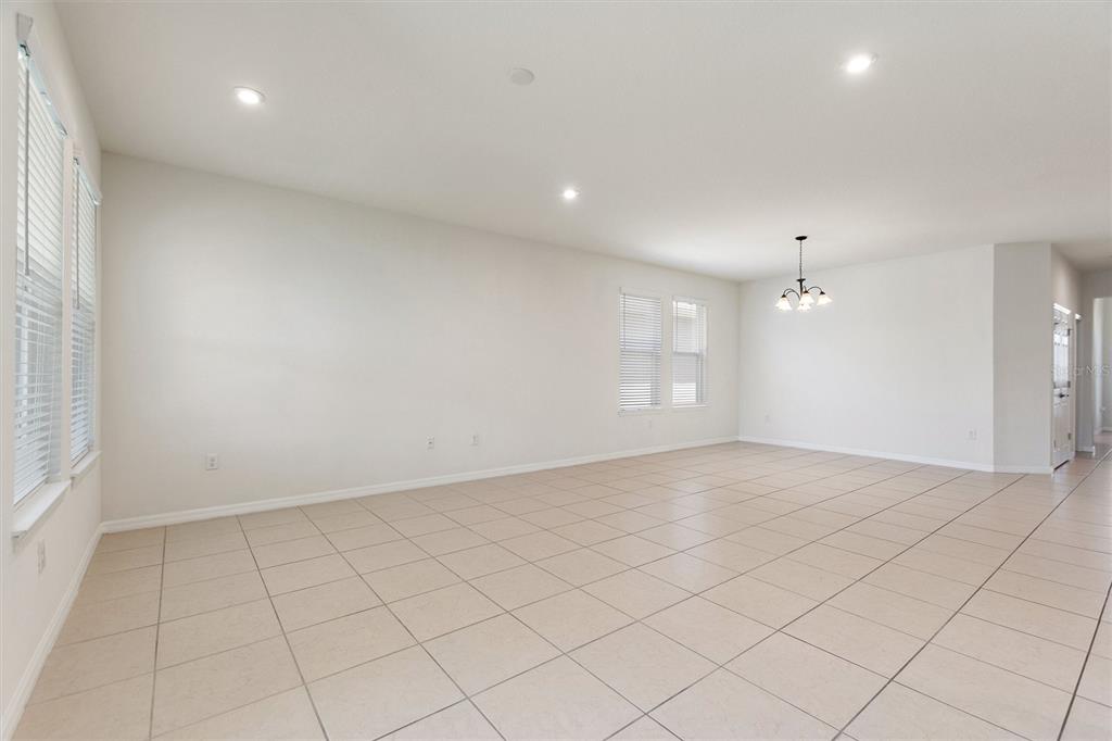 2500 Avian Loop Kissimmee, FL 34741 - Photo 14 of 35 an empty room with white walls and windows