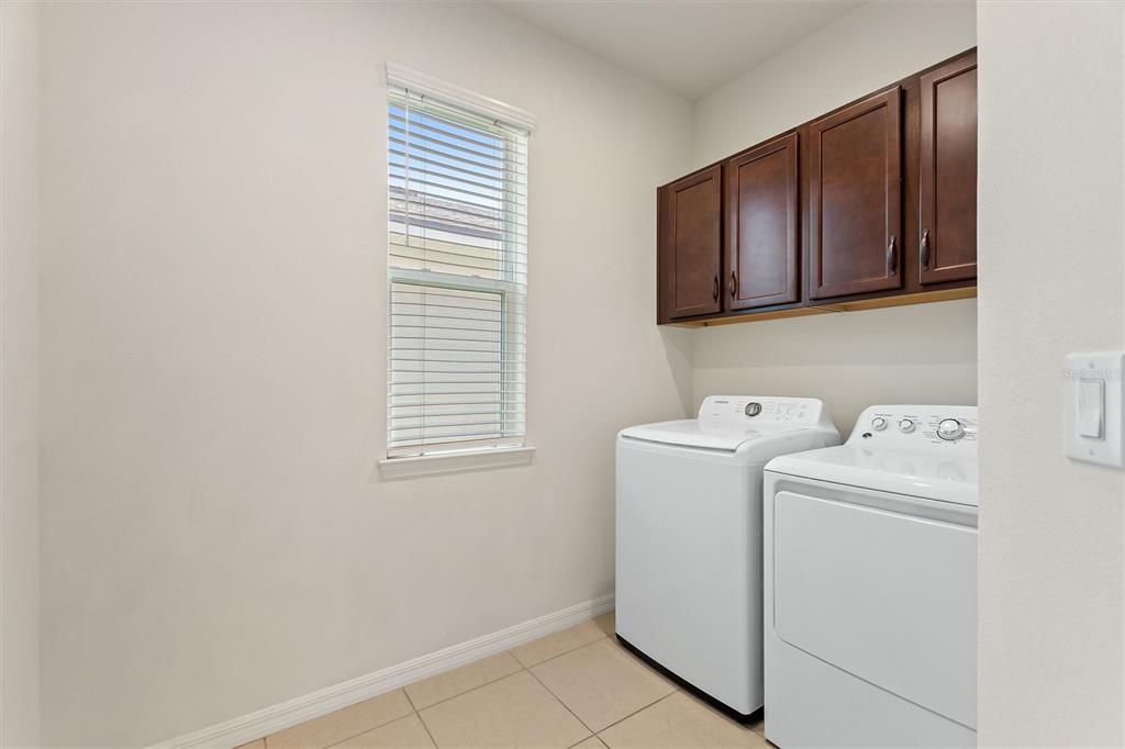 2500 Avian Loop Kissimmee, FL 34741 - Photo 19 of 35 a utility room with dryer and washer