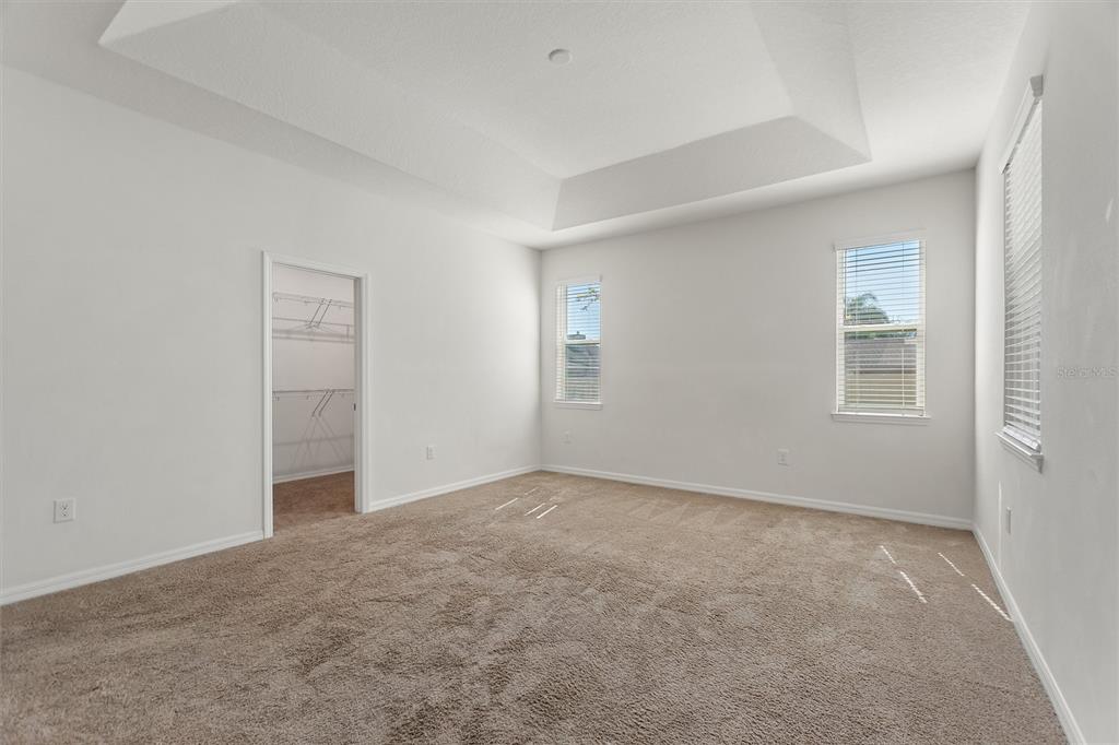 2500 Avian Loop Kissimmee, FL 34741 - Photo 20 of 35 an empty room with windows