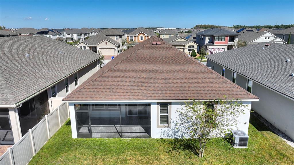 2500 Avian Loop Kissimmee, FL 34741 - Photo 24 of 35 an aerial view of a house with a yard