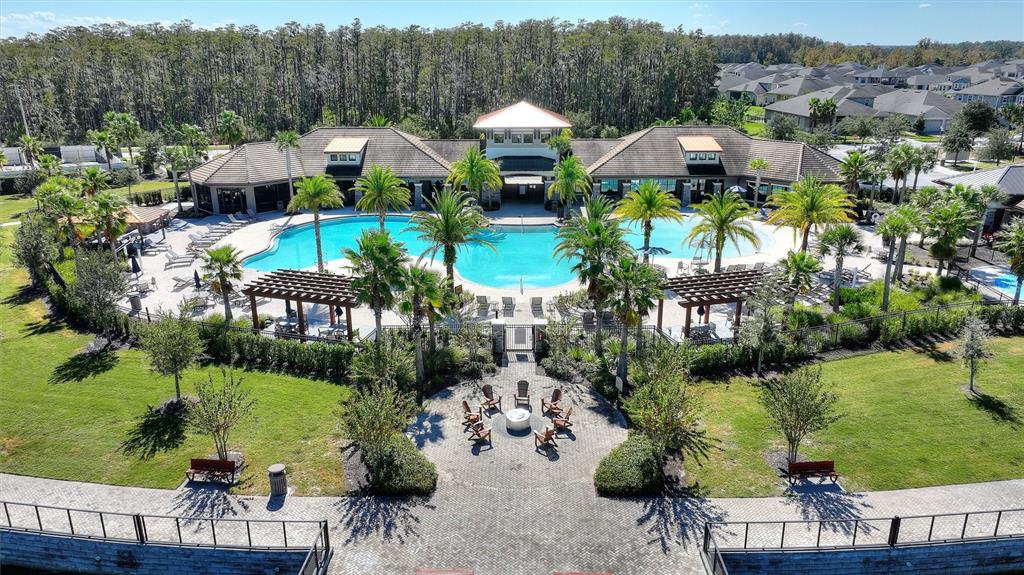 2500 Avian Loop Kissimmee, FL 34741 - Photo 30 of 35 an aerial view of a house with a garden and lake view