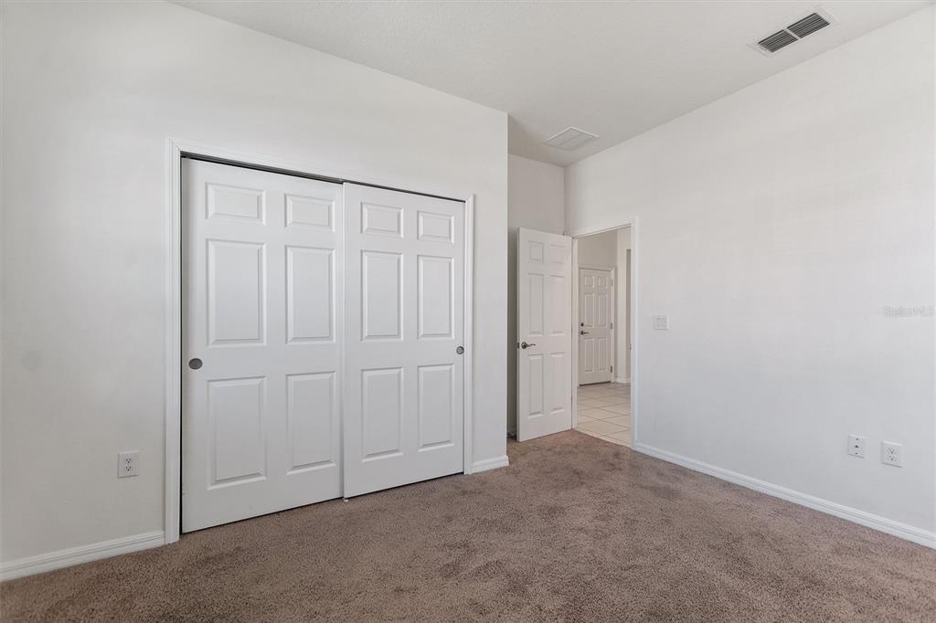 2500 Avian Loop Kissimmee, FL 34741 - Photo 4 of 35 an empty room with closet area