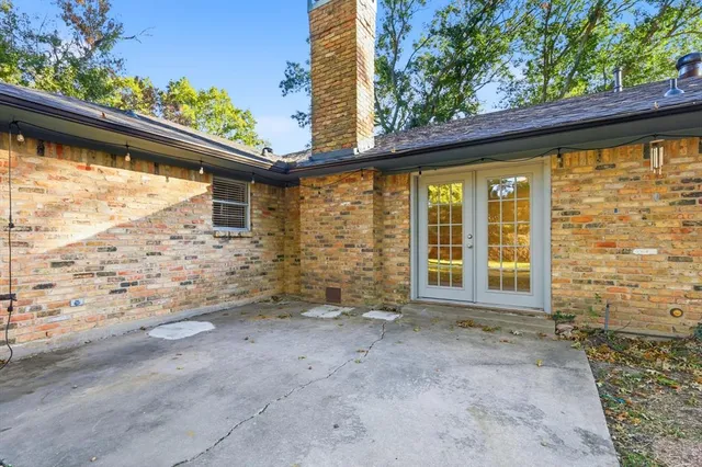 a view of a house with a large window