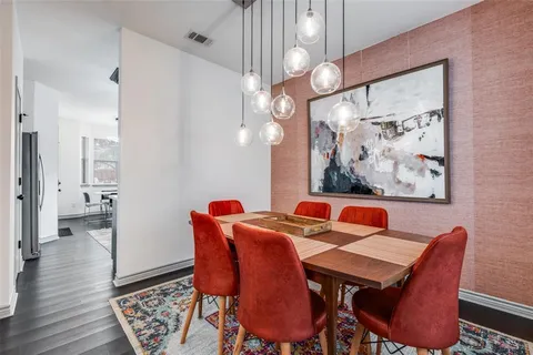 a view of a dining room with furniture