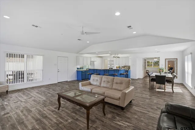 a living room with furniture and a table
