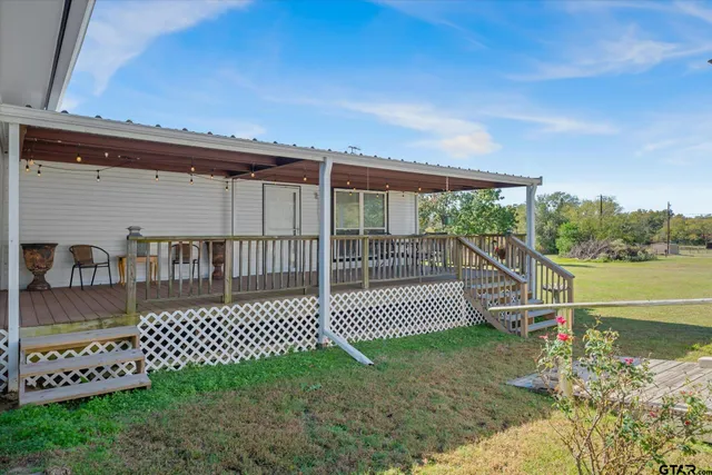 a view of a wrought iron fences in front of house