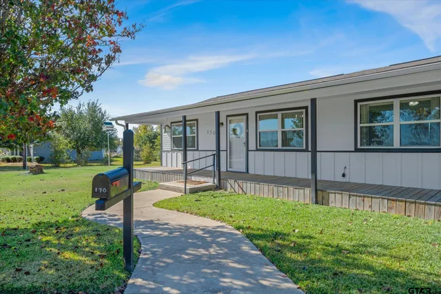 a house view with a garden space