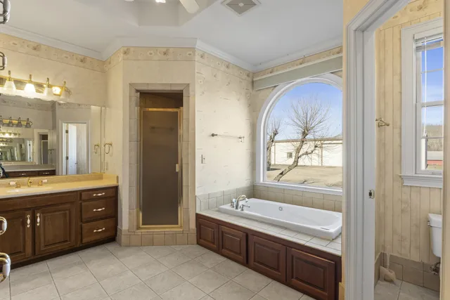 a kitchen with a refrigerator and a sink