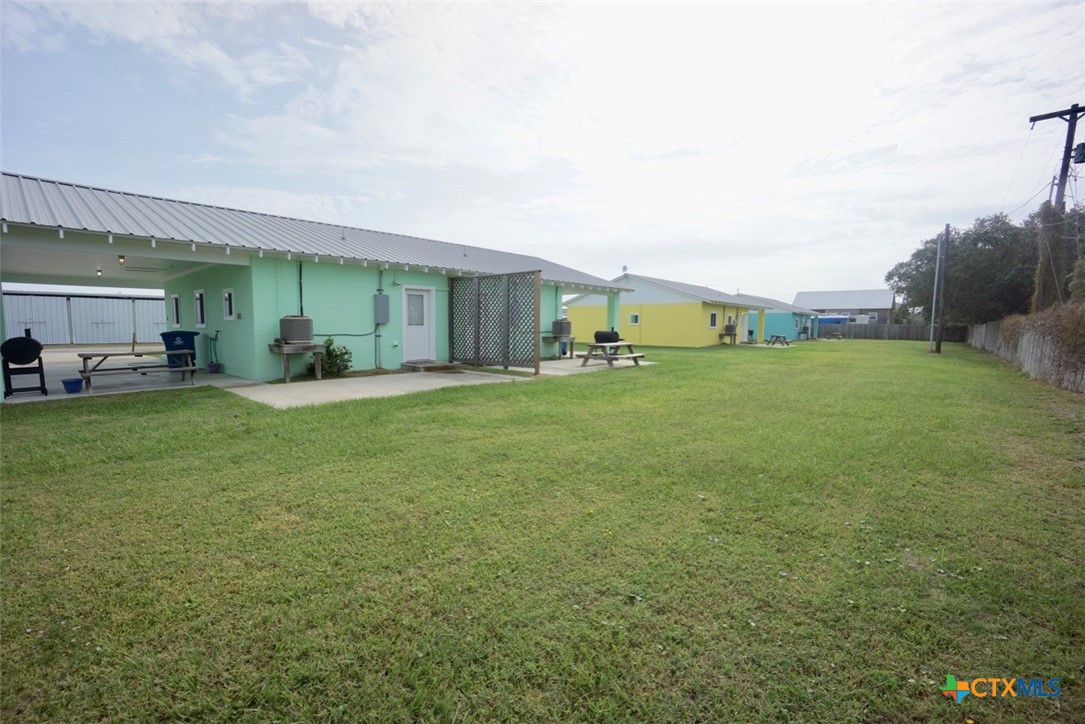 75-unit # 2 75-unit Street Port O'Connor, TX 77982 - Photo 17 of 18 a large yard with lots of green space and fence
