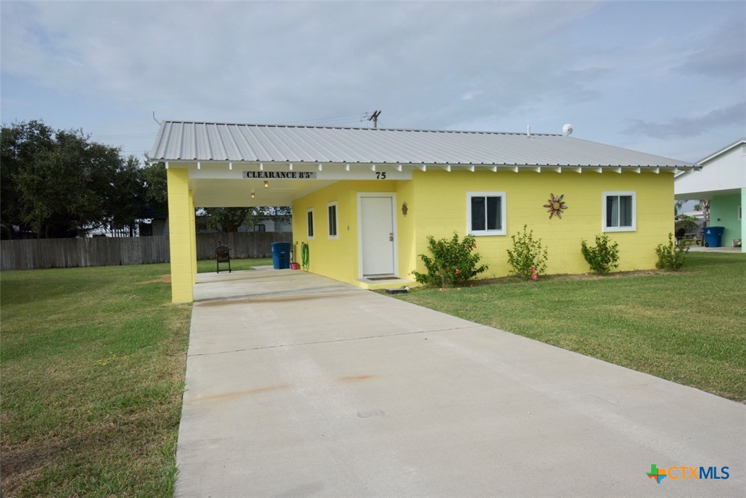 75-unit # 2 75-unit Street Port O'Connor, TX 77982 - Photo 2 of 18 a view of a house with a swimming pool