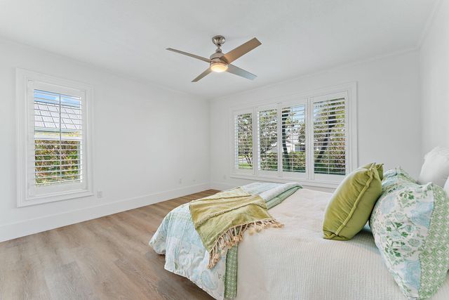 a bathroom with a sink a mirror and a shower