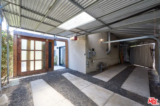 a view of a back yard of a table and a chair