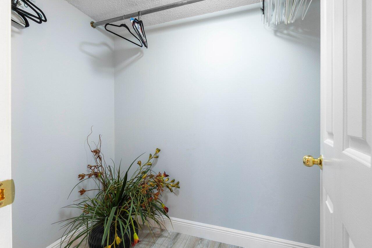 401 Clubhouse Circle, Unit 401A Jupiter, FL 33477 - Photo 18 of 34 a view of small space with potted plant