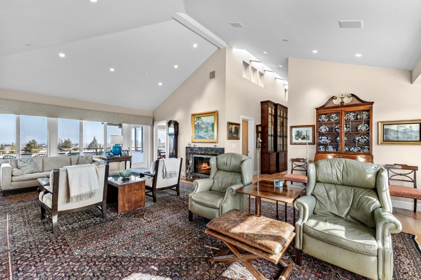 24 Mounds Road, Unit E San Mateo, CA 94402 - Photo 2 of 8 a living room with furniture and a large window