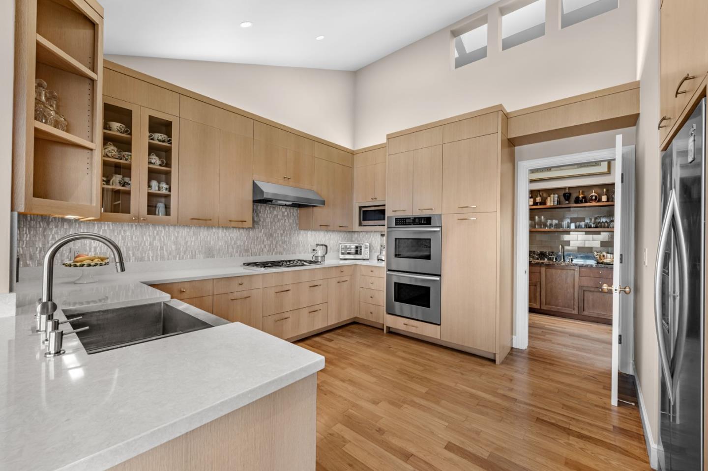 24 Mounds Road, Unit E San Mateo, CA 94402 - Photo 4 of 8 a kitchen with a refrigerator sink and stove