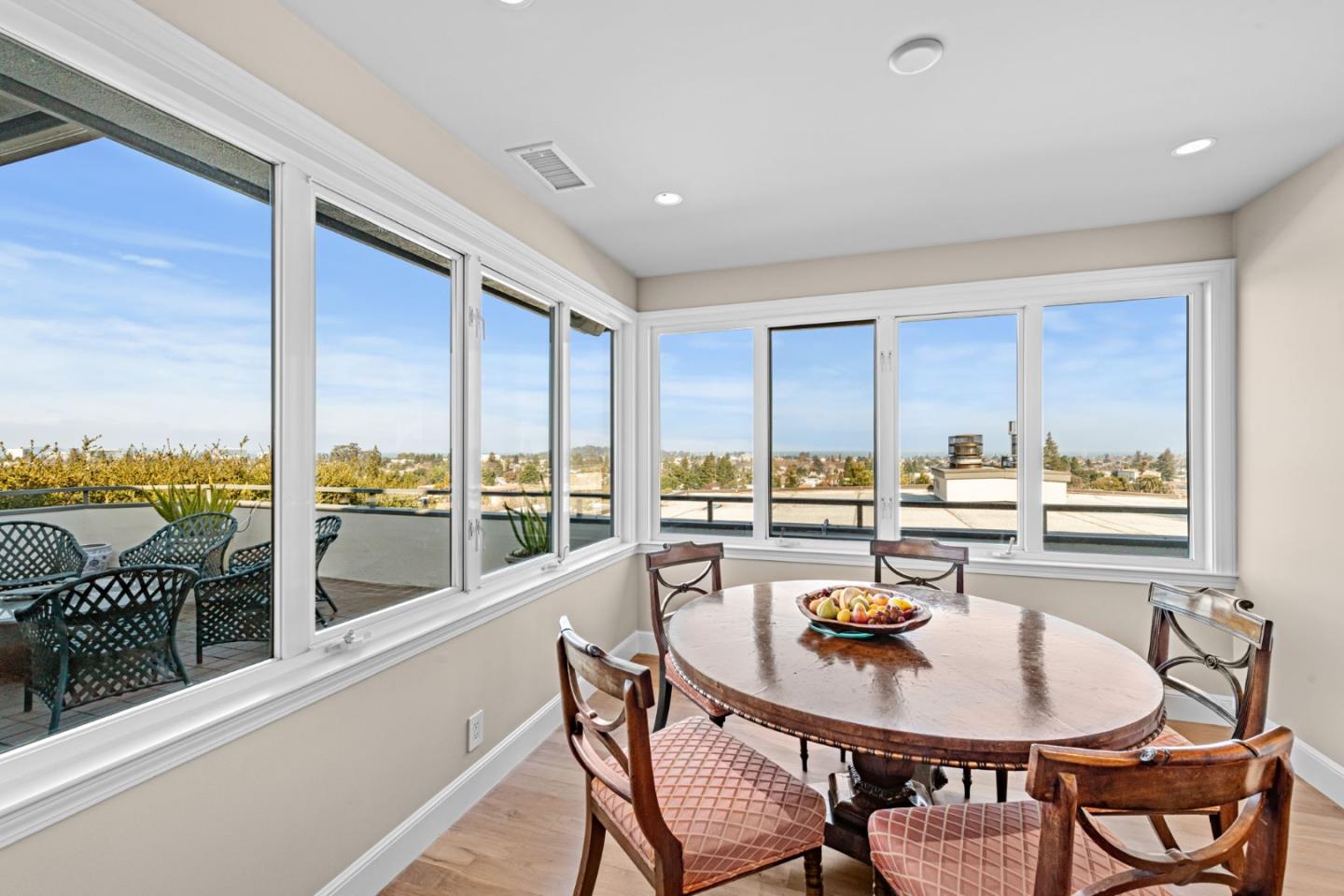 24 Mounds Road, Unit E San Mateo, CA 94402 - Photo 6 of 8 a view of a dining room with furniture window and outside view