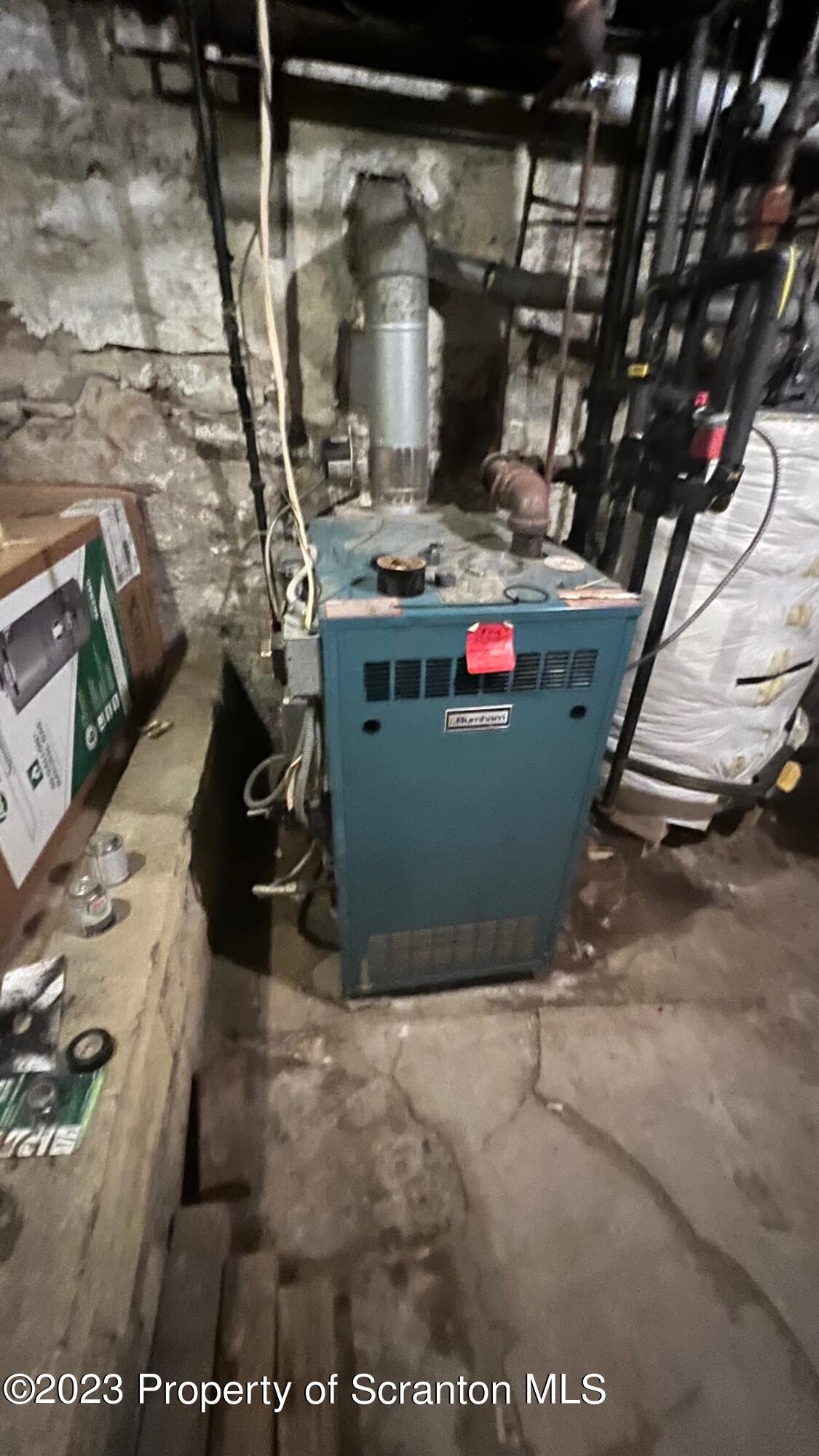 526 George Street Old Forge, PA 18518 - Photo 28 of 43 a view of water heater room