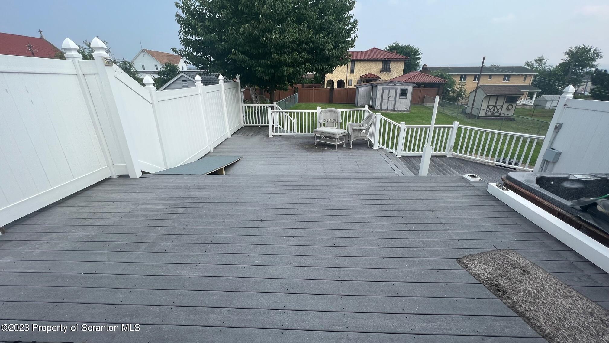 526 George Street Old Forge, PA 18518 - Photo 33 of 43 a view of a deck with wooden floor and fence