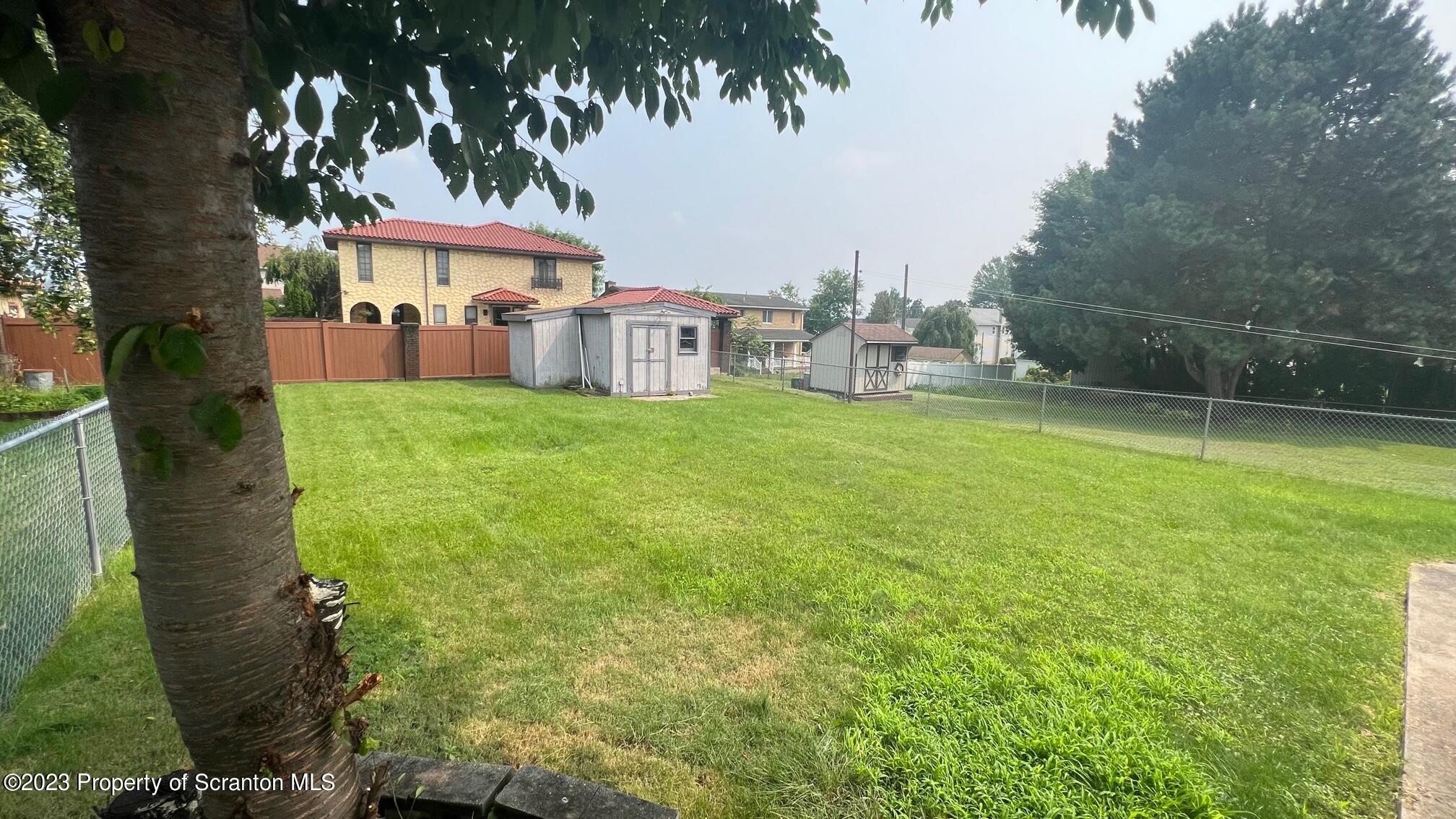 526 George Street Old Forge, PA 18518 - Photo 40 of 43 a front view of a house with a yard
