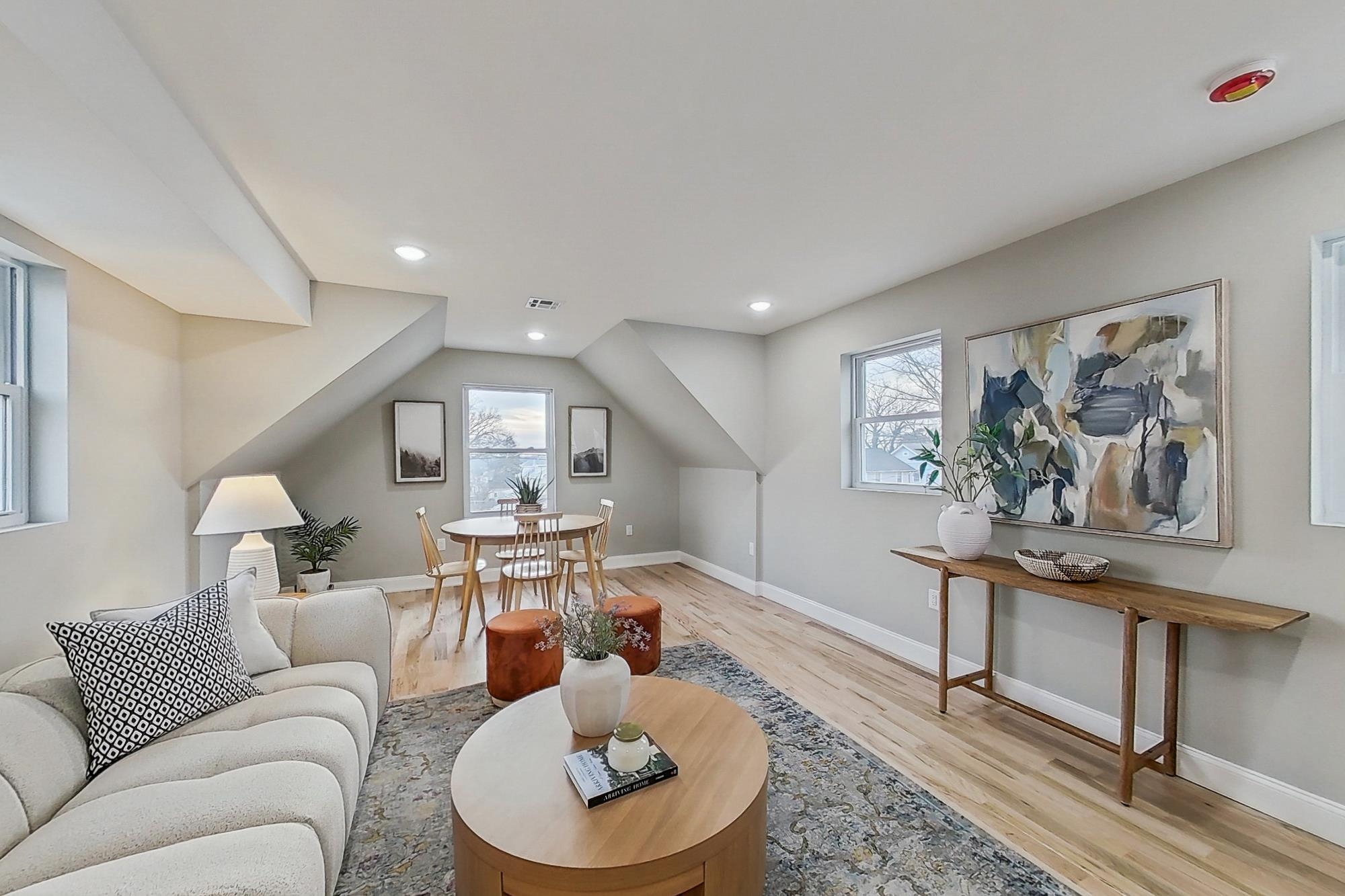 261 Winans Avenue Hillside, NJ 07205 - Photo 27 of 48 a living room with furniture and wooden floor