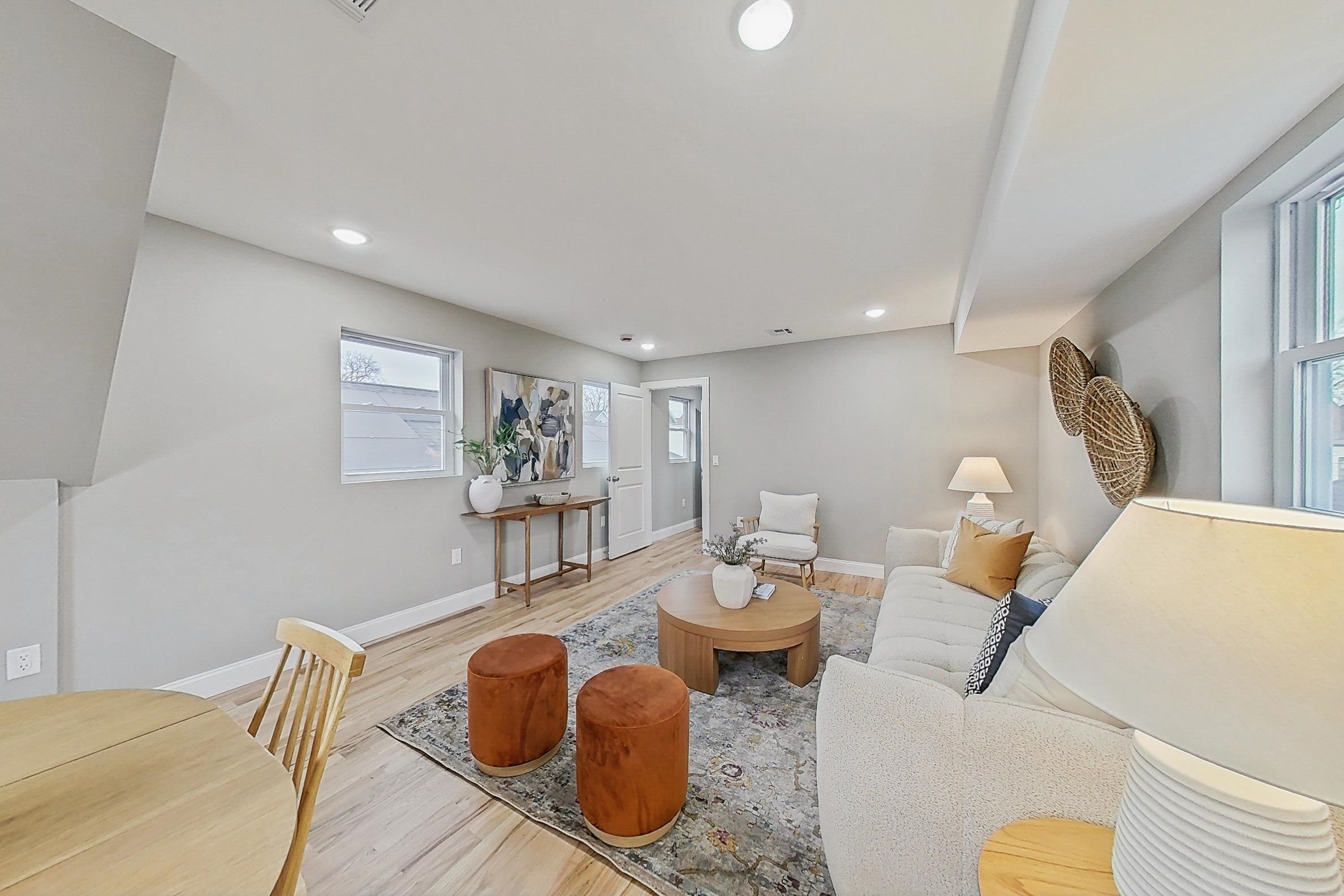261 Winans Avenue Hillside, NJ 07205 - Photo 30 of 48 a living room with furniture and a table