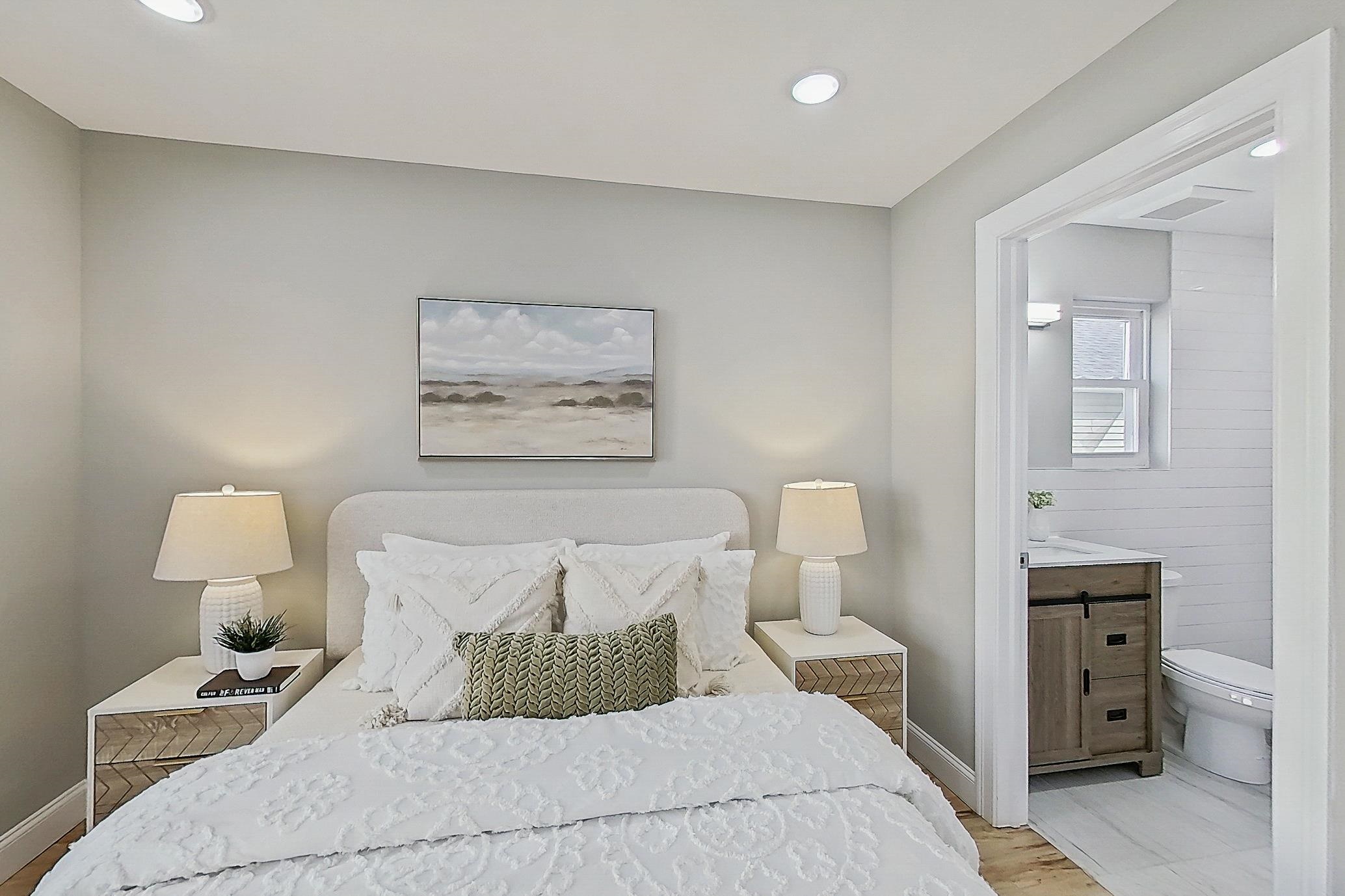 261 Winans Avenue Hillside, NJ 07205 - Photo 36 of 48 a bedroom with a bed and a lamp