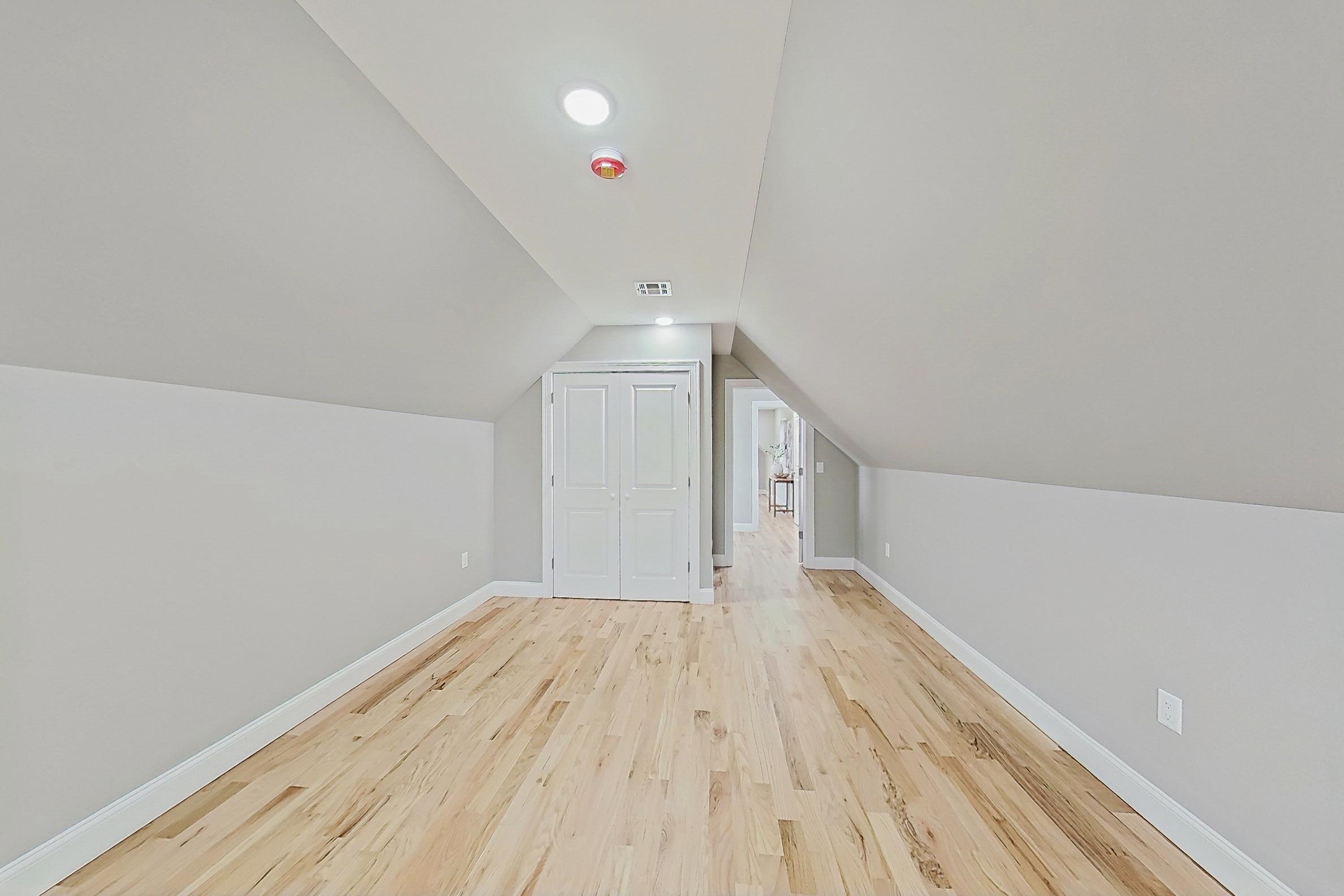 261 Winans Avenue Hillside, NJ 07205 - Photo 40 of 48 a view of empty room with wooden floor