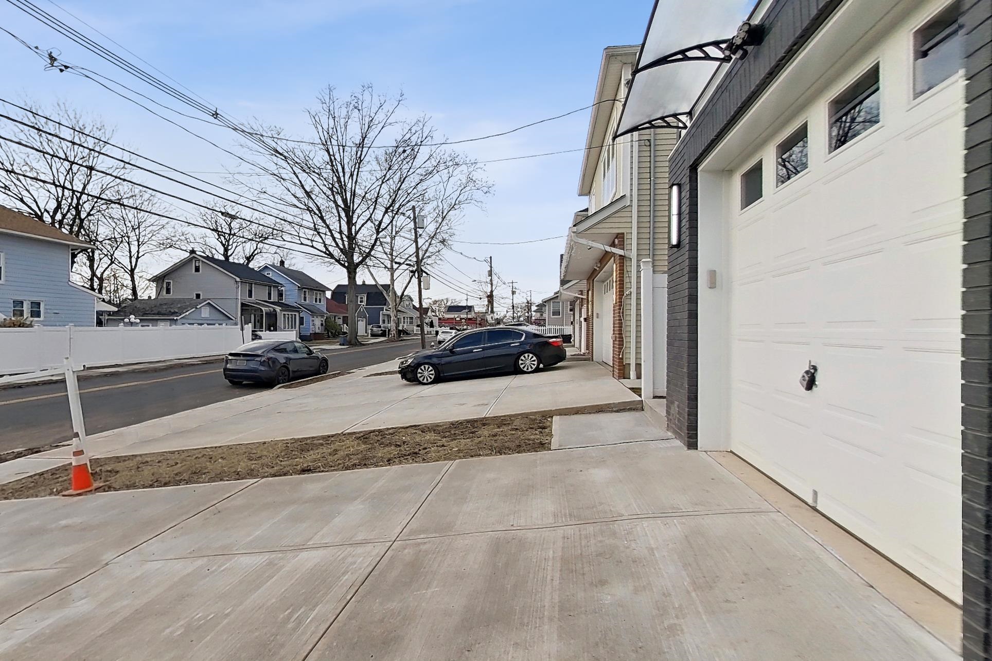 261 Winans Avenue Hillside, NJ 07205 - Photo 6 of 48 a view of a building with a street