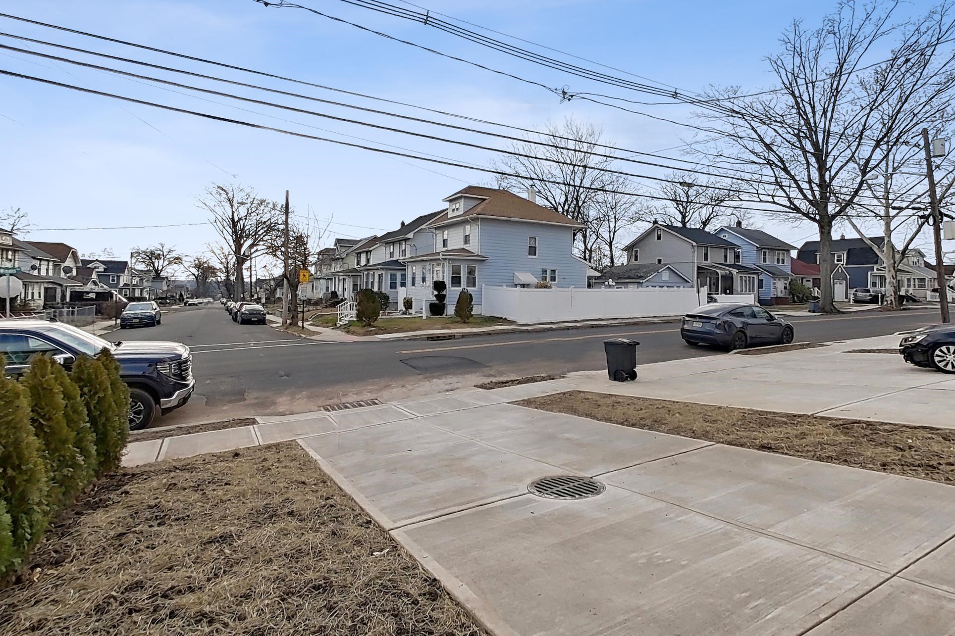261 Winans Avenue Hillside, NJ 07205 - Photo 7 of 48 a view of a cars park in front of a building