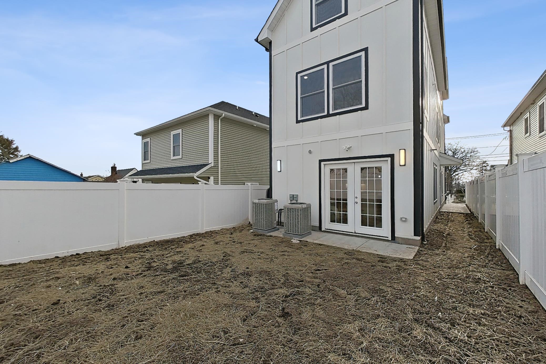 261 Winans Avenue Hillside, NJ 07205 - Photo 8 of 48 a house with trees in the background