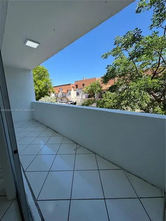 a view of a livingroom and window