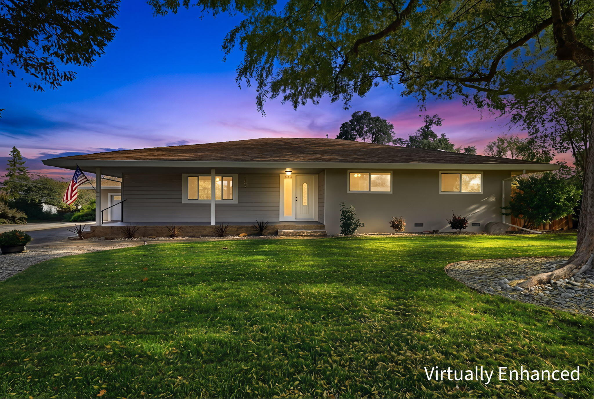 3911 Roesner Avenue Redding, CA 96002 - Photo 3 of 42 a front view of a house with a garden