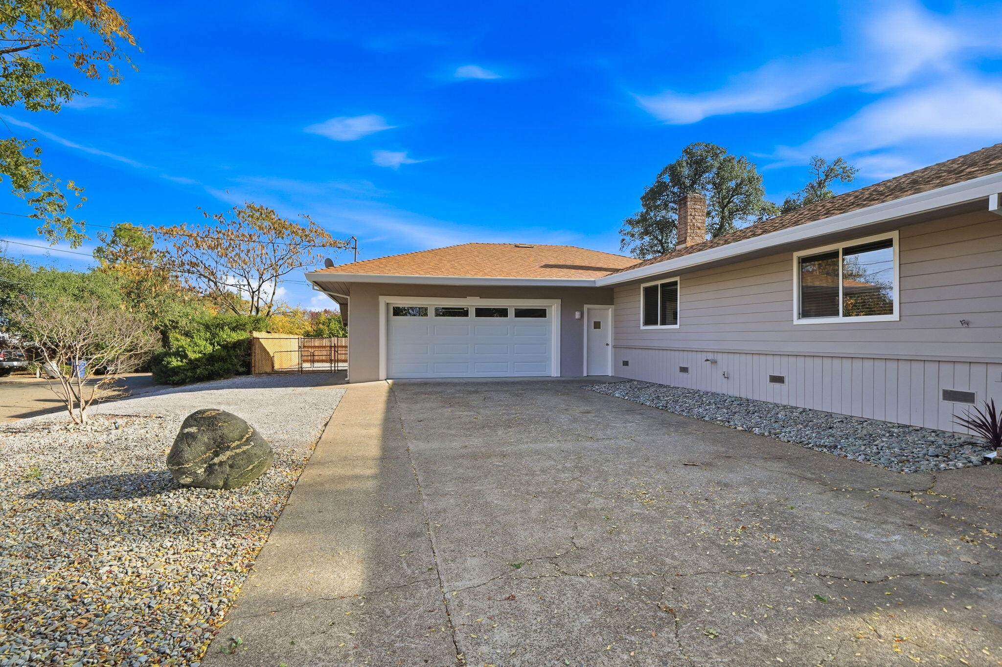 3911 Roesner Avenue Redding, CA 96002 - Photo 41 of 42 a view of a house with a yard