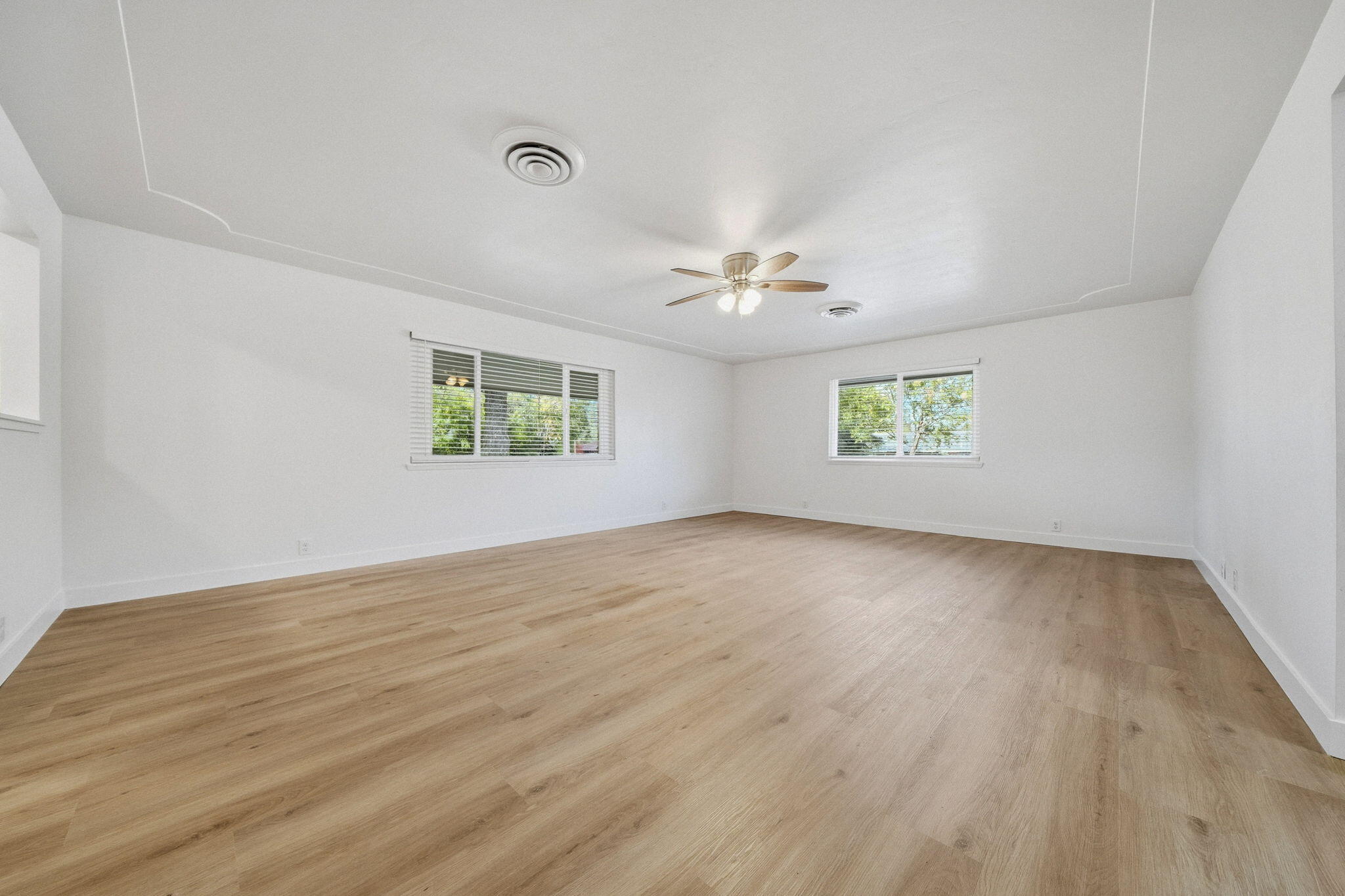 3911 Roesner Avenue Redding, CA 96002 - Photo 7 of 42 wooden floor in an empty room with a window