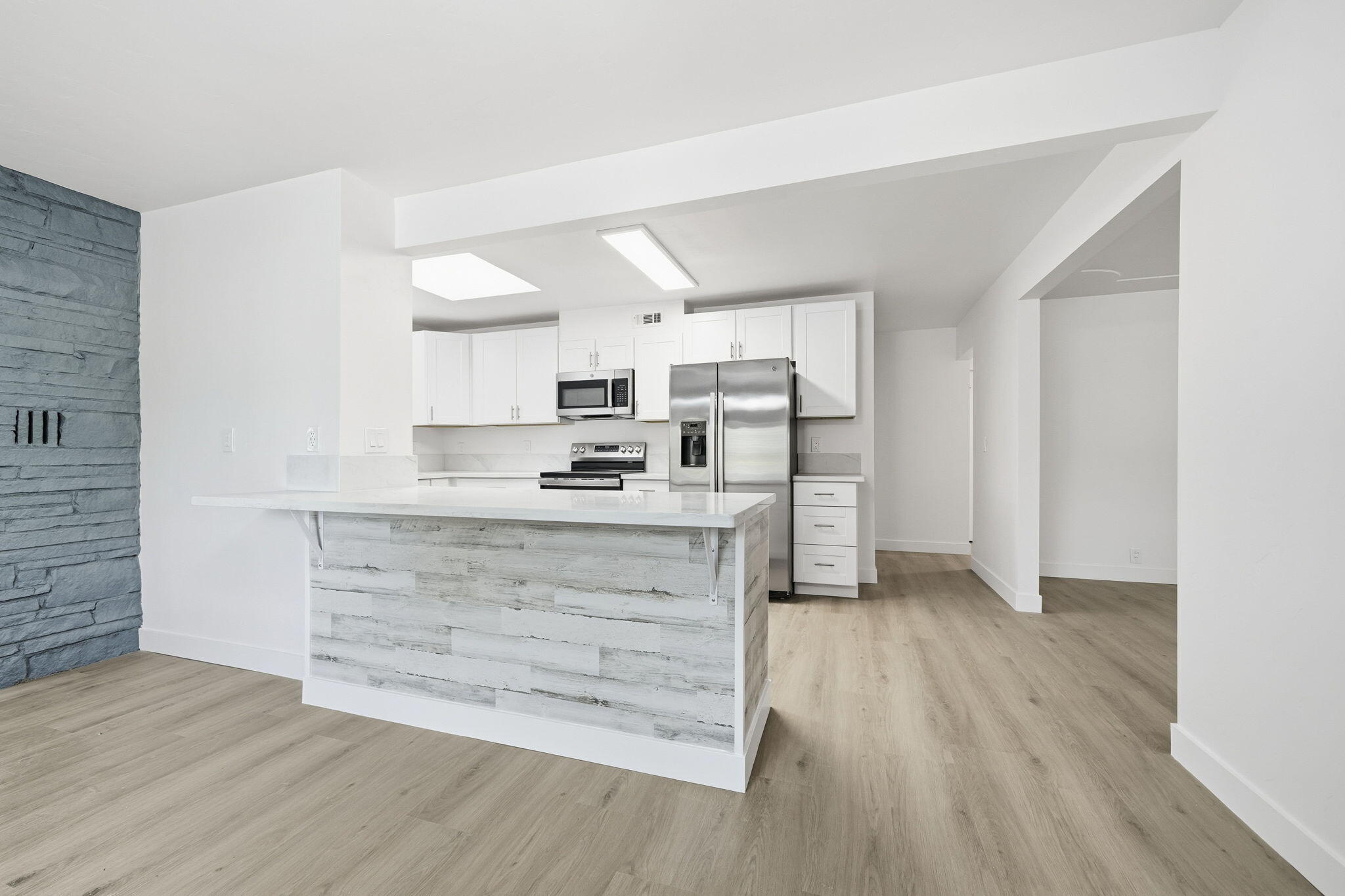 3911 Roesner Avenue Redding, CA 96002 - Photo 8 of 42 a view of kitchen with wooden floor and electronic appliances
