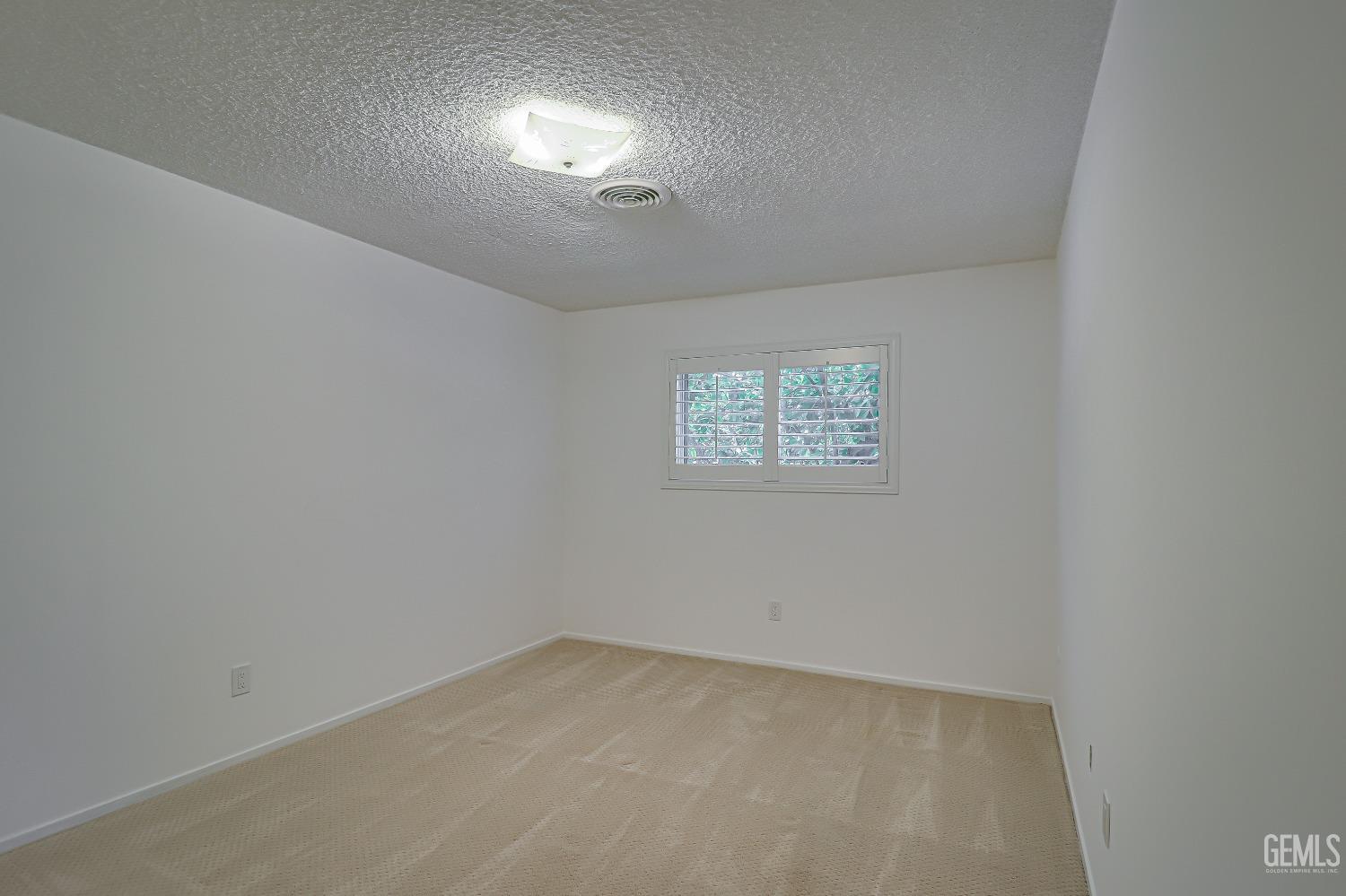 Undisclosed Address Bakersfield, CA 93309 - Photo 21 of 34 an empty room with a empty space