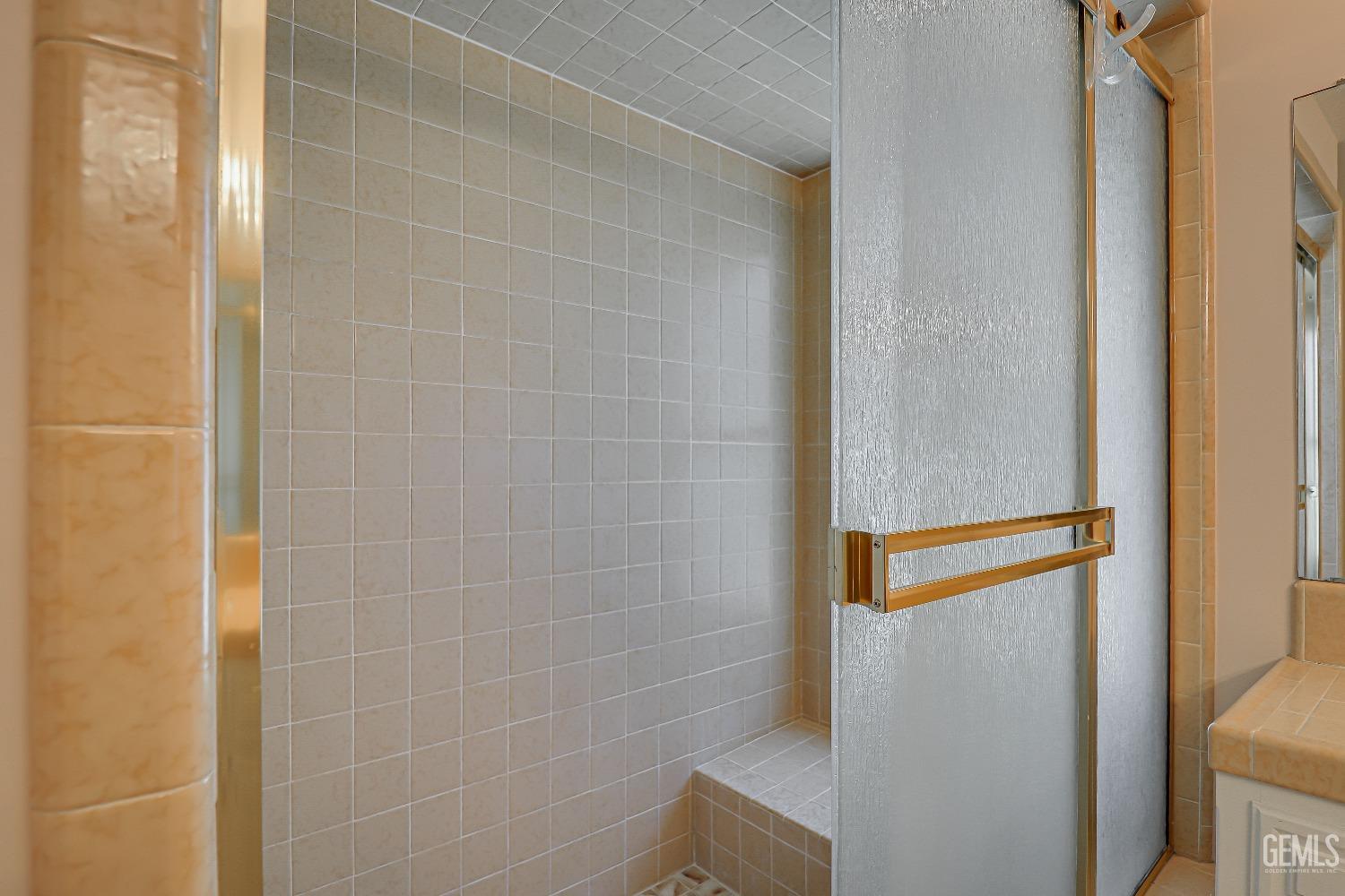 Undisclosed Address Bakersfield, CA 93309 - Photo 26 of 34 a bathroom with a shower