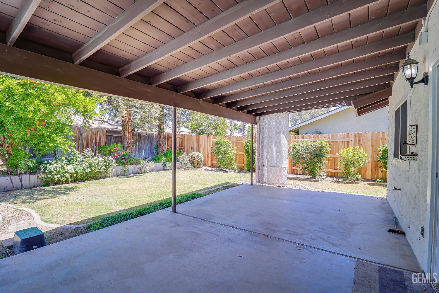 Undisclosed Address Bakersfield, CA 93309 - Photo 28 of 34 a view of a backyard of a house