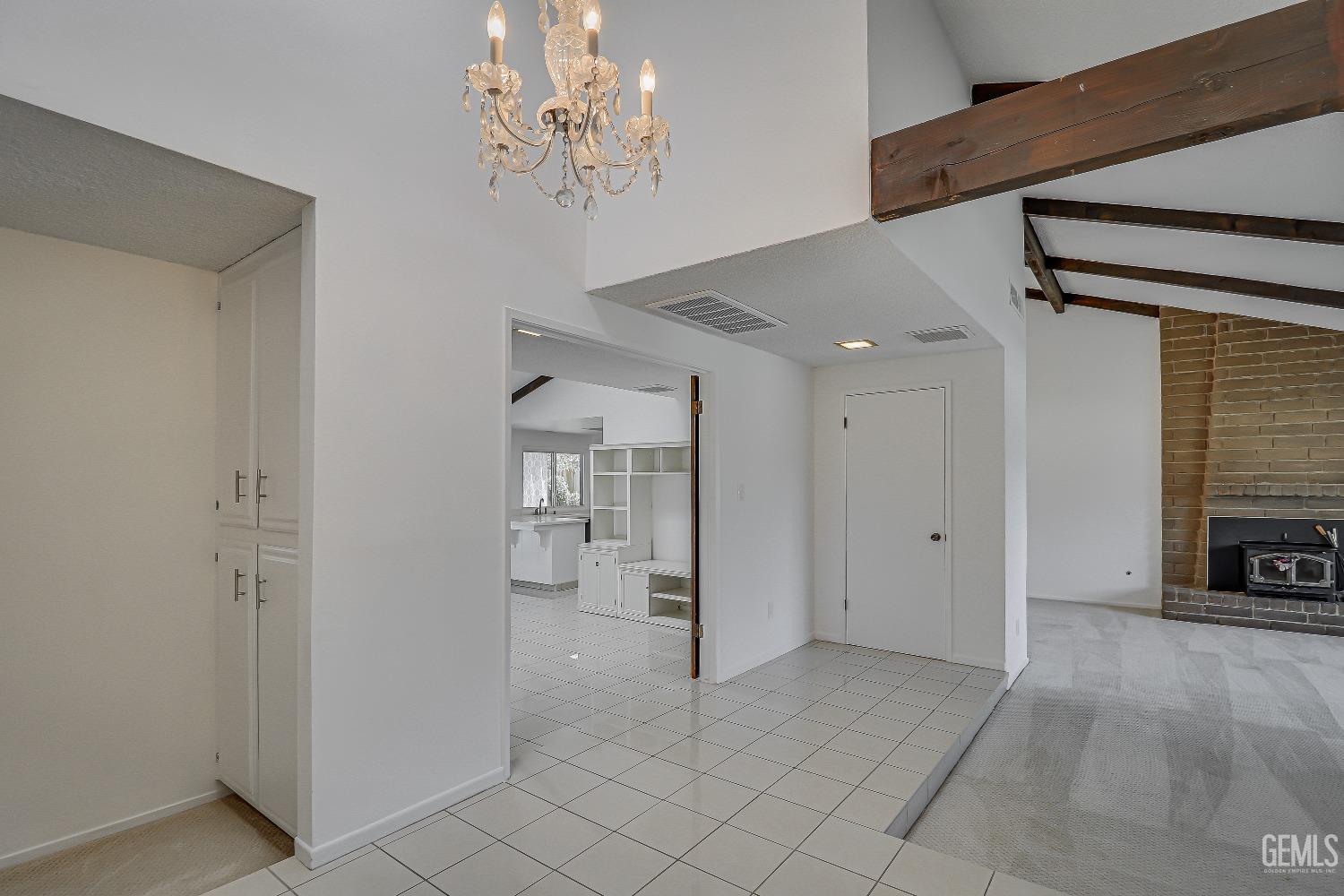 Undisclosed Address Bakersfield, CA 93309 - Photo 6 of 34 a view of a livingroom with a kitchen