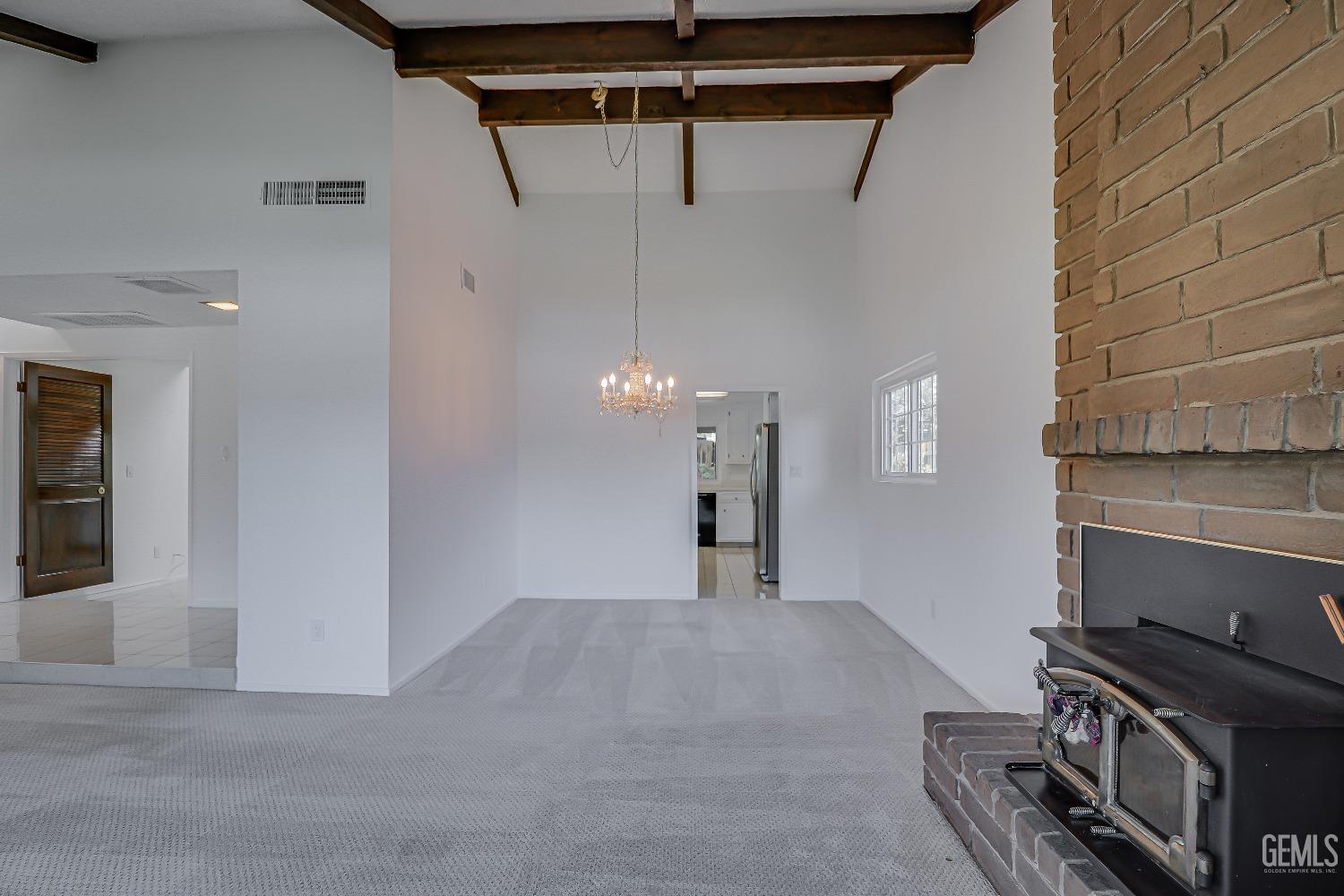 Undisclosed Address Bakersfield, CA 93309 - Photo 10 of 34 a view of a livingroom with a staircase