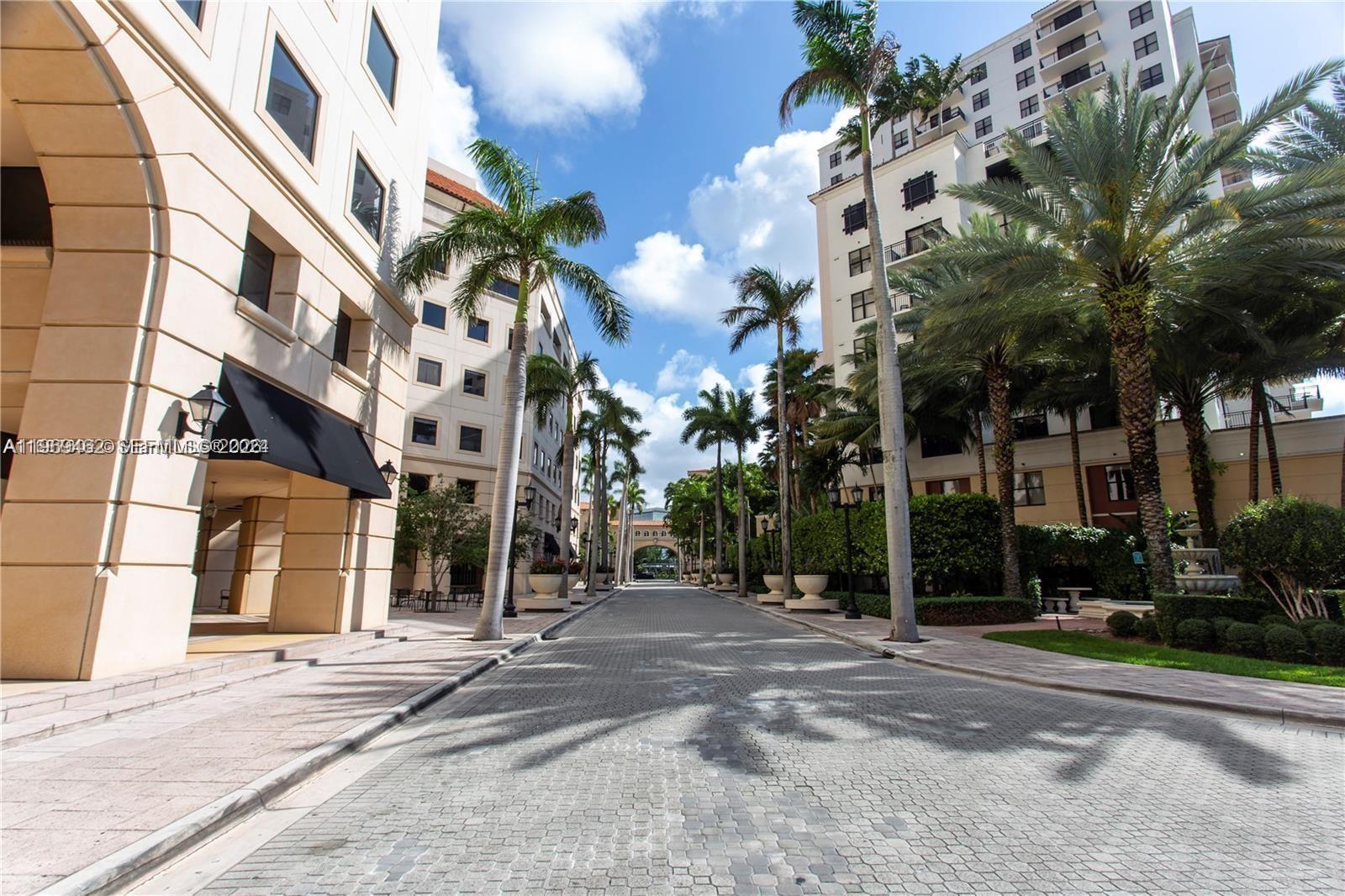 888 Douglas Road, Unit 1405 Coral Gables, FL 33134 - Photo 24 of 42 a view of a building with a street