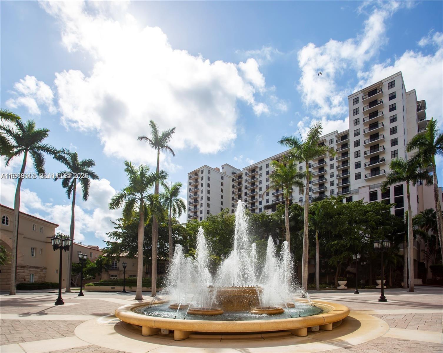 888 Douglas Road, Unit 1405 Coral Gables, FL 33134 - Photo 27 of 42 a view of a water fountain in front of a building