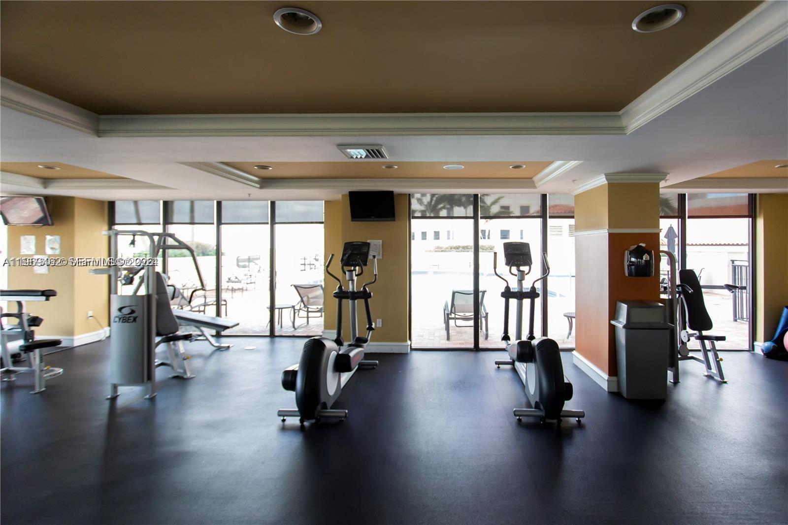 888 Douglas Road, Unit 1405 Coral Gables, FL 33134 - Photo 29 of 42 a view of a room with gym equipment