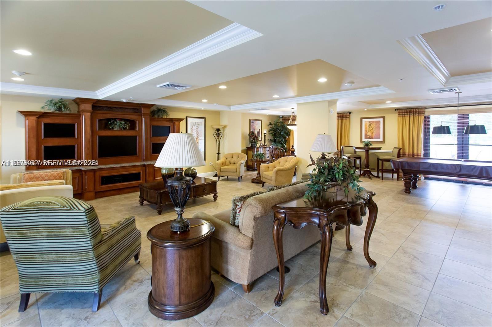 888 Douglas Road, Unit 1405 Coral Gables, FL 33134 - Photo 34 of 42 a living room with furniture