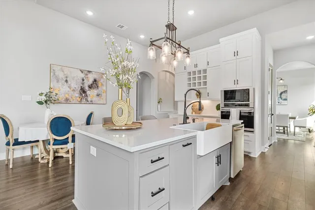 a view of dining table chairs and entryway