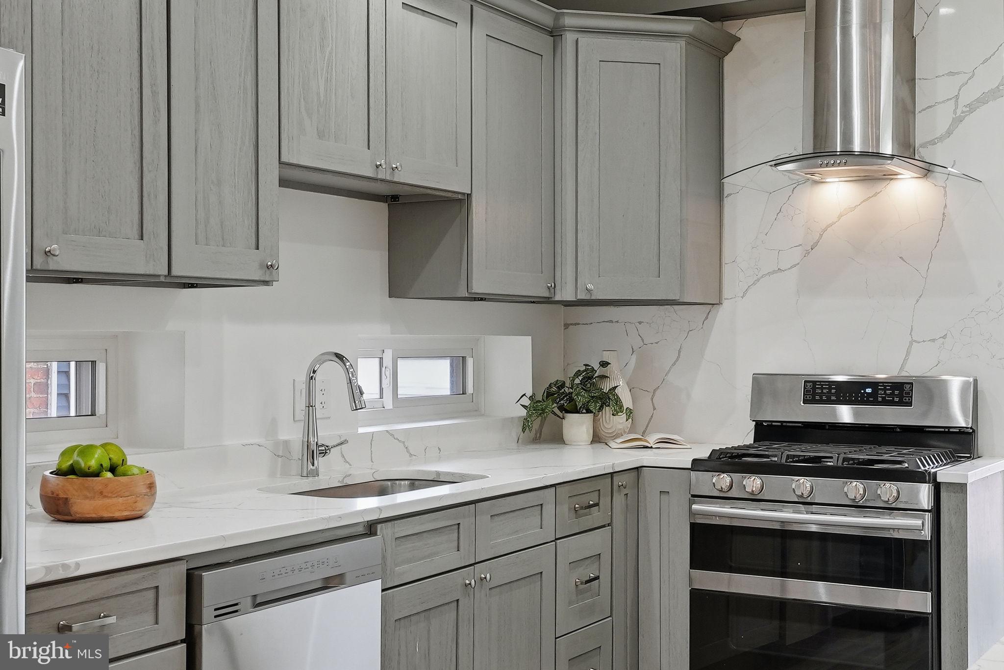 2121 4th Street Northeast, Unit 1 Washington, DC 20002 - Photo 12 of 34 Modern kitchen with sleek design.