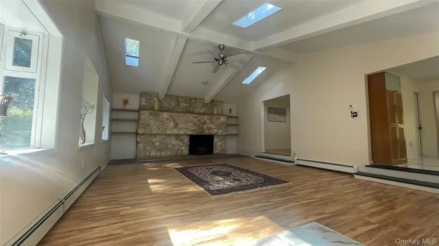 a bathroom with a toilet a sink and bathtub
